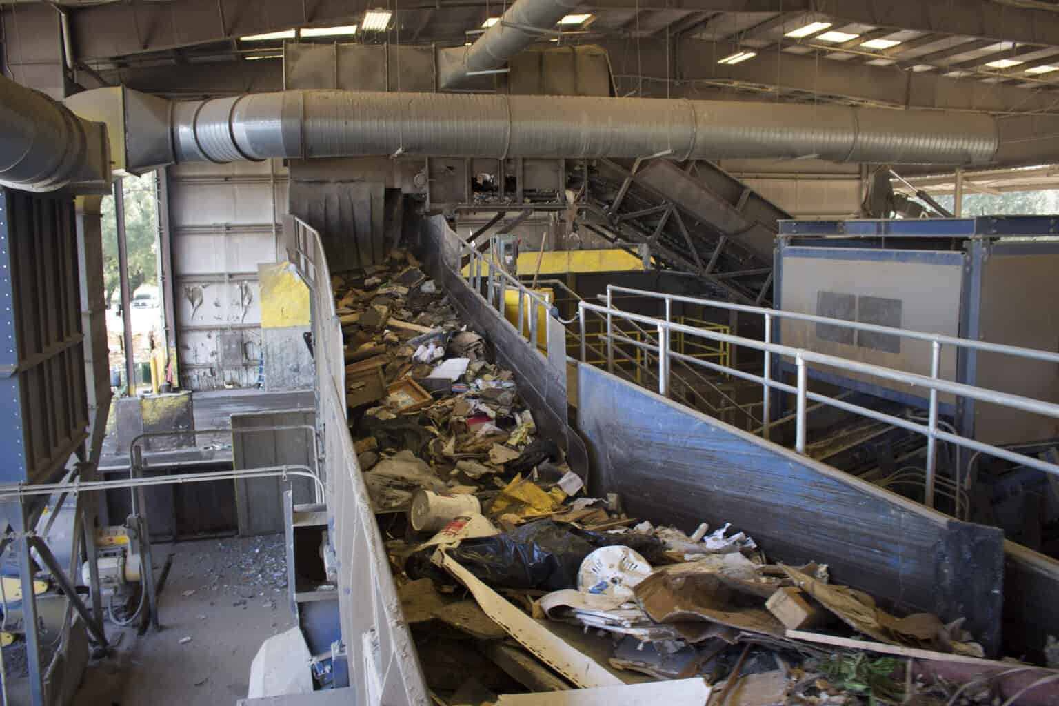 Recycling facility with bales of sorted materials